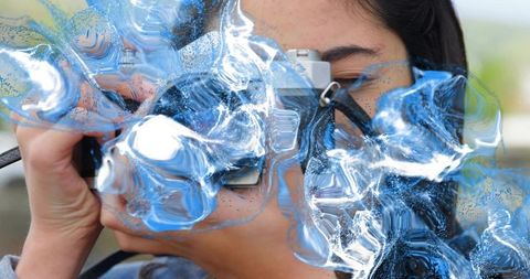 Artistic Portrait of Woman with Creative Blue Ripple Effect