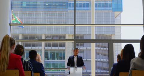 Business Presentation in Modern Glass Building with View