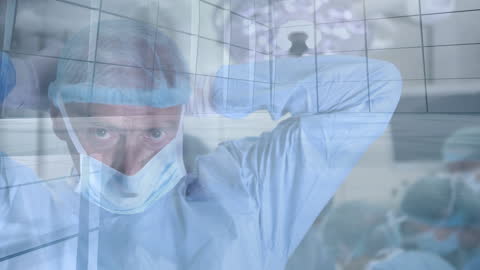 Experienced Surgeon Preparing in Modern Operating Room