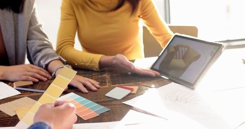 Creative Design Meeting with 3D Technology and Color Swatches