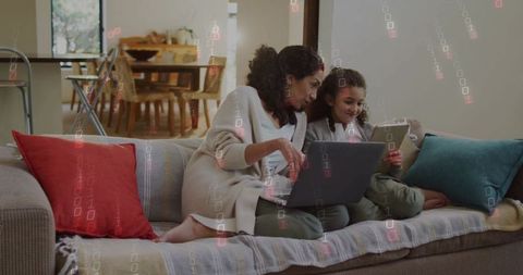 Mother and daughter sharing tablet and laptop on sofa learning while bonding with tech overlay