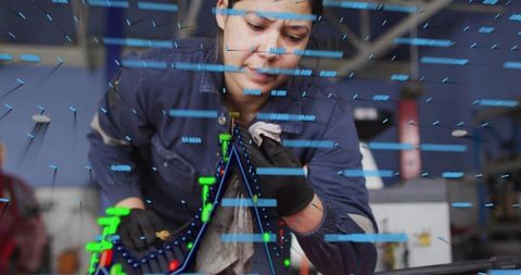 Female mechanic wiping engine bay with futuristic hud overlay, inspecting and diagnosing
