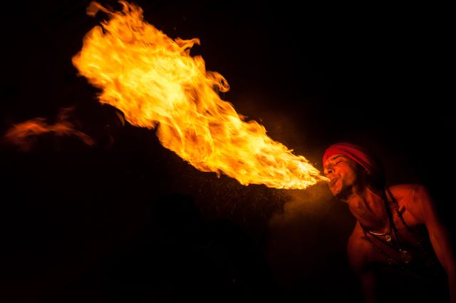 Fiery Breath of Street Performer at Night - Download Free Stock Photos Pikwizard.com