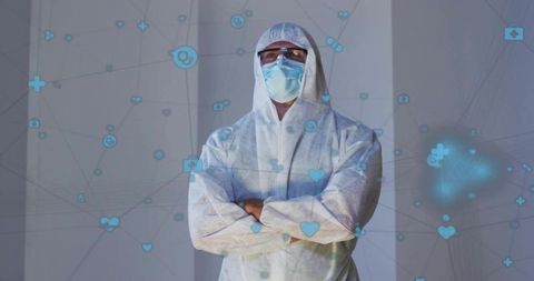 Standing healthcare worker in full ppe with mask and goggles and medical network overlay