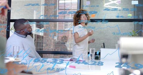 Business Colleagues Engaging in Presentation with Digital Analytics