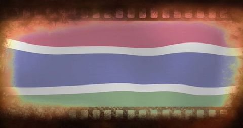 Vintage filmstrip flag rippling with grunge vignette and light leak for retro design