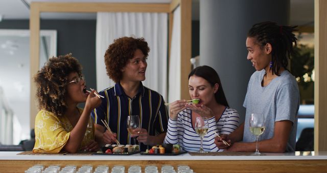 Group of friends enjoying sushi and wine together in a modern and stylish restaurant. Perfect for illustrations of dining out, social gatherings, and multicultural friendships. Ideal for culinary blogs, restaurant promotions, and social media content showcasing dining experiences.