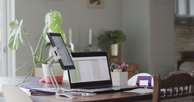 Ideal for illustrating remote workspace setups, work-from-home environments, and productivity. Suitable for articles and blogs about home office setups and tips. Highlights modern and organized home office decor, combining technology and nature.