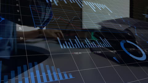 Digital Composite of Financial Graphs over Business Workspace