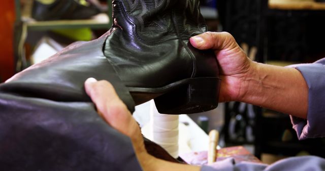 Craftsman Repairing Leather Boot in Workshop - Download Free Stock Images Pikwizard.com