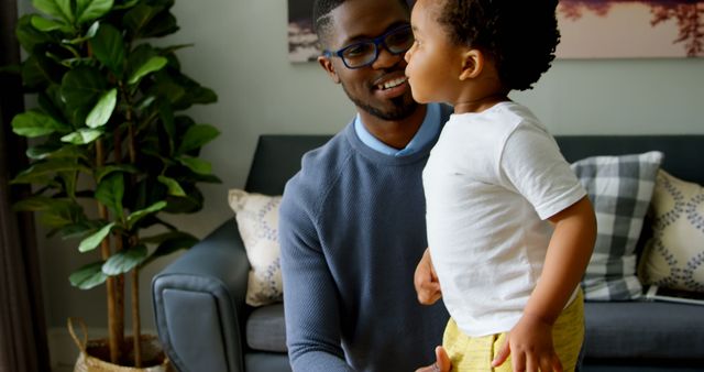 Father Bonding With Young Son in Cozy Living Room - Download Free Stock Images Pikwizard.com