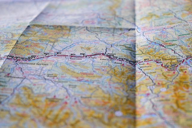 Close-Up of a Folded Road Map with Geographic Details - Download Free Stock Photos Pikwizard.com