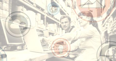 Innovative technology concept with professionals in warehouse