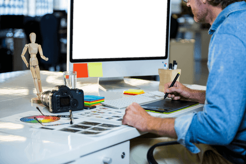 Creative Professional Using Graphics Tablet at Desk with Transparent Screen - Download Free Stock Videos Pikwizard.com