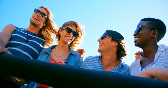 Group of Friends Enjoying Sunny Day Outdoors, Smiling and Laughing - Download Free Stock Images Pikwizard.com