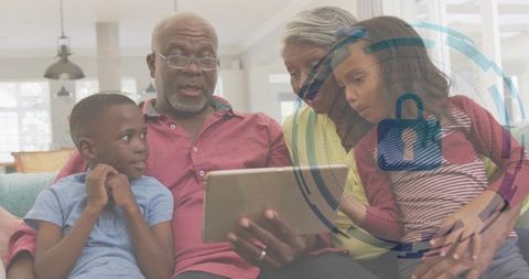 Multigenerational family using tablet at home with digital privacy padlock overlay
