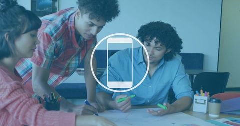 Creative team collaborating in modern office meeting space