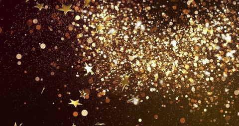 Golden glitter and star confetti scattering across dark bokeh backdrop for festive luxury