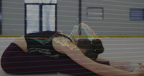 Teen Stretching in Yoga Pose with Overlaid Graph