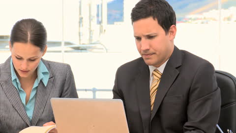 Focused Teamwork in Modern Office Environment