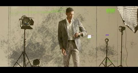 Model in Suit Checking Watch in Professional Studio Setting