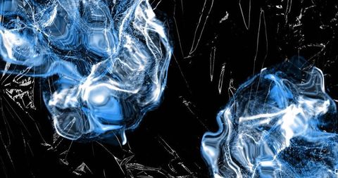 Abstract blue and white light patterns on shiny black surface