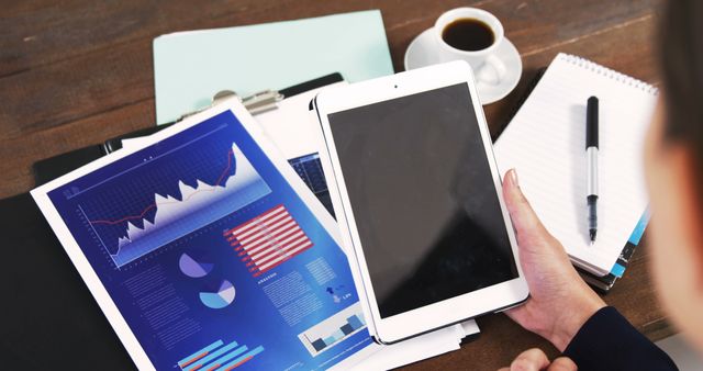 Caucasian businesswoman using tablet at desk with copy space - Download Free Stock Photos Pikwizard.com