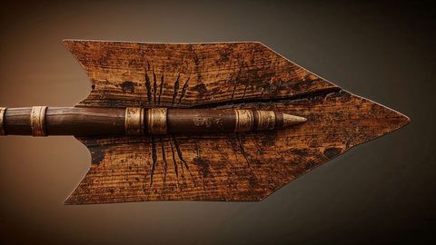 Antique wooden broadhead arrowhead with metal tip