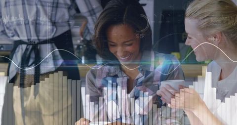 Casual business meeting with digital analytics overlay in café