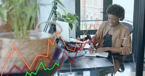 Entrepreneur analyzing data in modern office