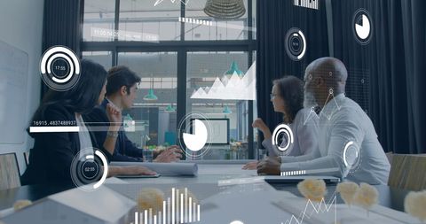 Diverse Team Analyzing Data in Modern Office for Technology Solutions