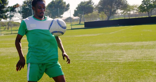 Soccer Player Practicing Ball Control on Field - Download Free Stock Images Pikwizard.com