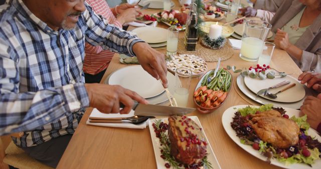 Family Celebrating Thanksgiving Dinner with Traditional Feast - Download Free Stock Images Pikwizard.com