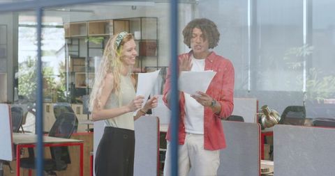 Cheerful Employees Celebrating Victory in Modern Office