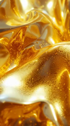 Rippling Liquid Gold Macro Vertical Video, Metallic Folds and Reflective Droplets Loop
