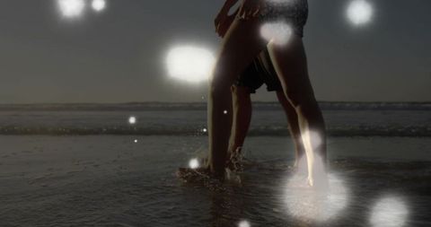 Romantic Beach Stroll at Twilight with Glowing Orbs