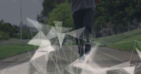 Male Athlete With Prosthetic Leg Running Virtual Network Overlay