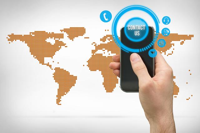 Hand holding smartphone with digital contact icons overlaying global map signifies modern communication and connectivity. Useful for illustrating global networking, technological advancements, international business, and digital communication.