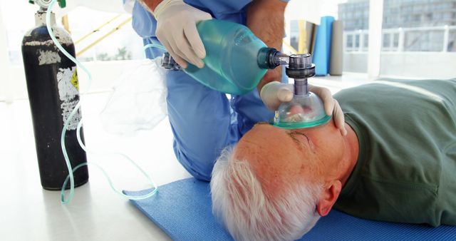 Paramedic Providing Oxygen to Senior Man During Emergency Situation - Download Free Stock Images Pikwizard.com