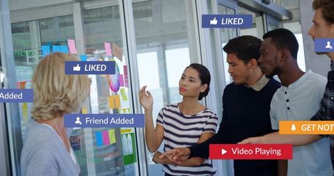 Collaborative Team Brainstorming in Modern Office with Digital Interface