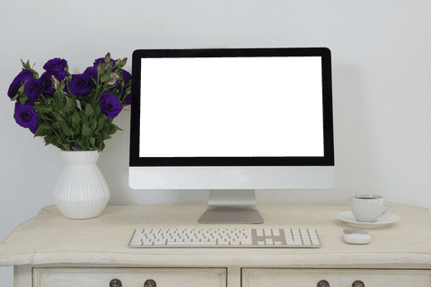 Minimalistic Office Desk with Empty Computer Screen and Vase of Flowers - Download Free Stock Videos Pikwizard.com