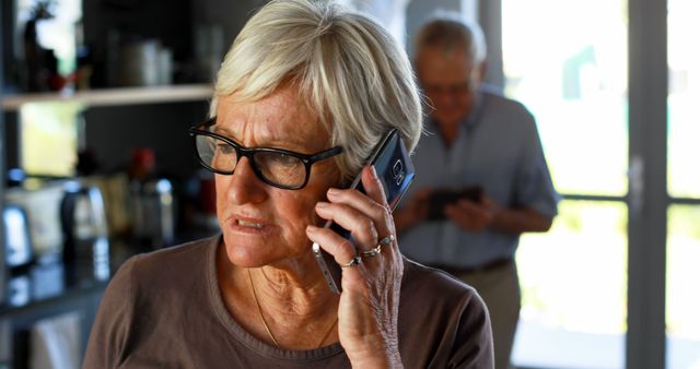 Senior Woman Using Mobile Phone in Home Setting - Download Free Stock Images Pikwizard.com