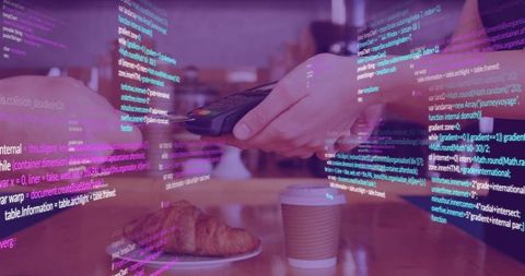 Paying with contactless card at café counter with augmented code overlay and pastry
