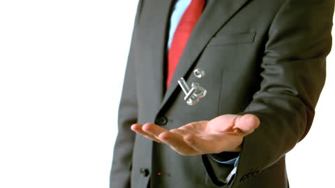 Businessman Practicing Balance with Floating Screw and Bolt
