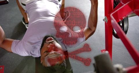Bench pressing man with red skull binary overlay illustrating workout risk and strain