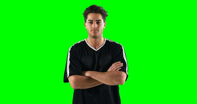 Confident Young Man in Black Shirt on Green Screen Background - Download Free Stock Images Pikwizard.com