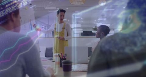 Business woman leads collaborative team meeting in modern office