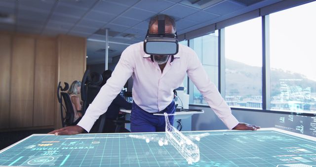 Businessman Using Virtual Reality for Aircraft Design in Modern Office - Download Free Stock Images Pikwizard.com