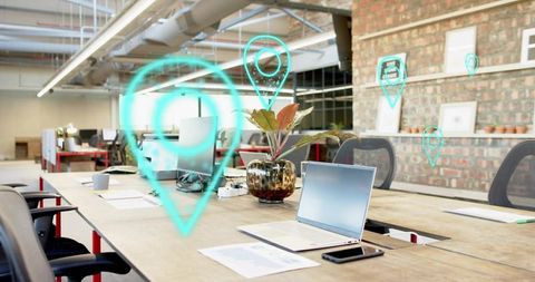 Coworking Desk Featuring Open Laptop, Augmented Reality Pins, Industrial Brick Interior