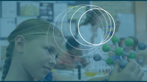 Innovative Learning: Schoolgirl Studying Molecular Model